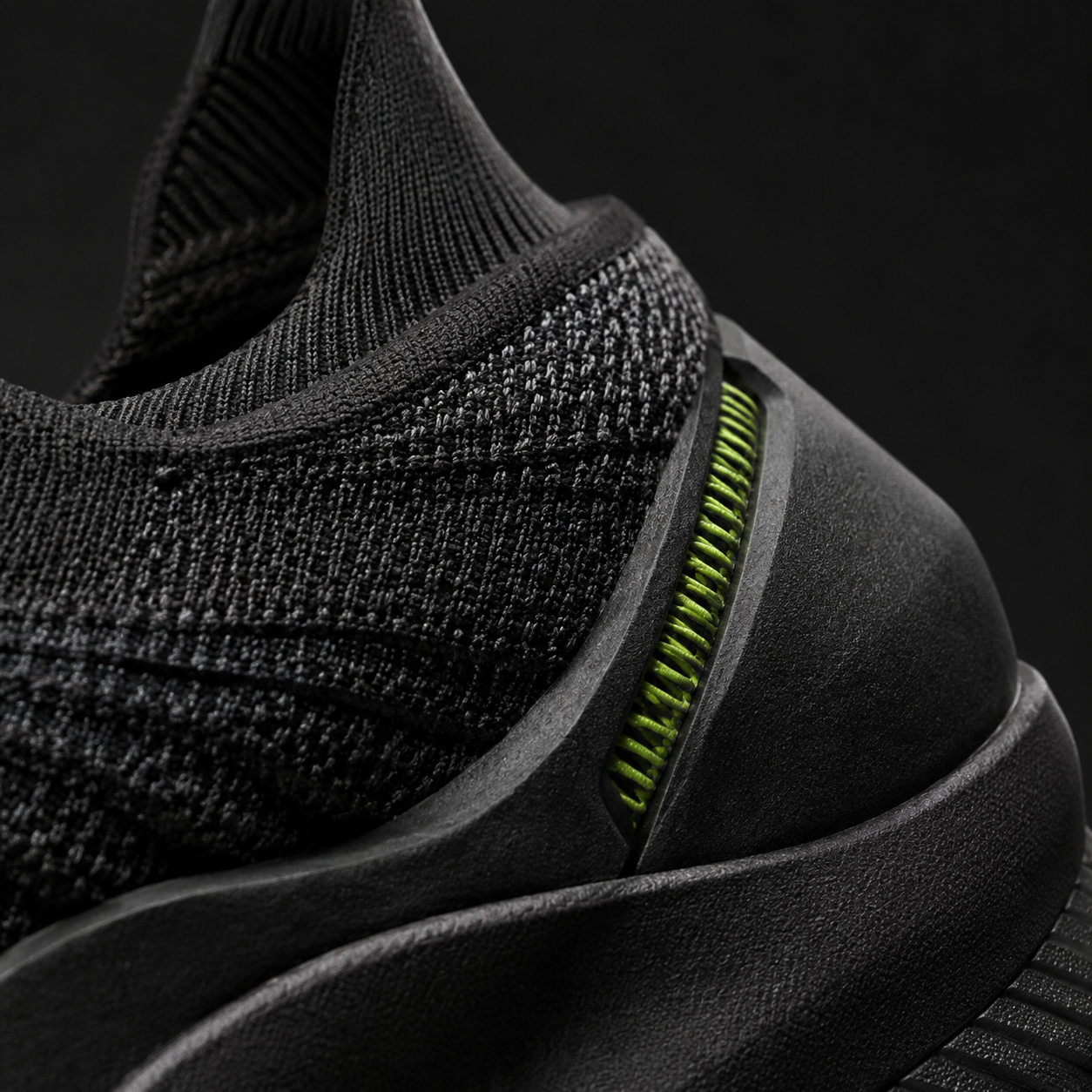 Macro detail of engineered knit running shoe upper